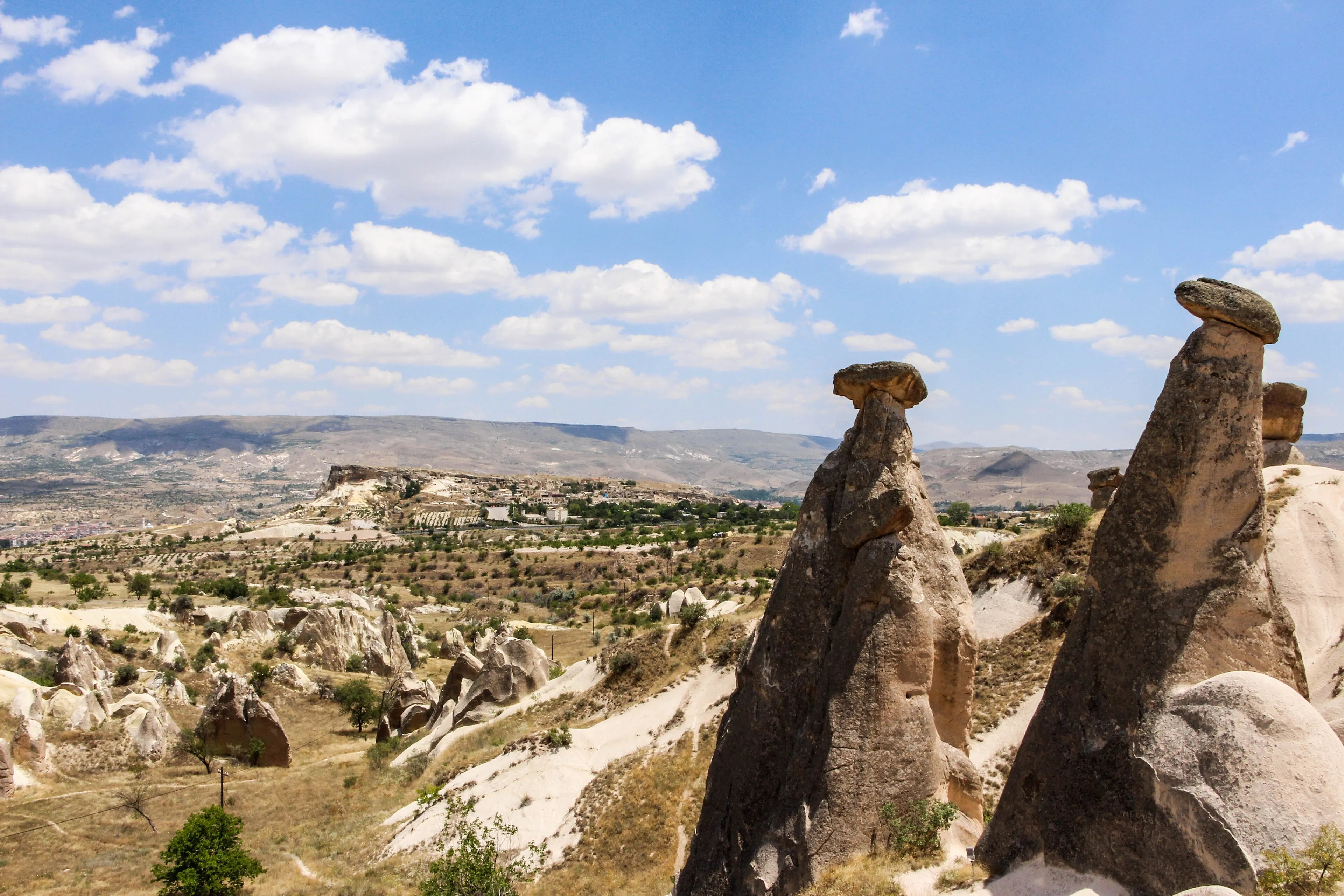 Cone-shaped fairy chimney rock formations in the Göreme area of Cappadocia