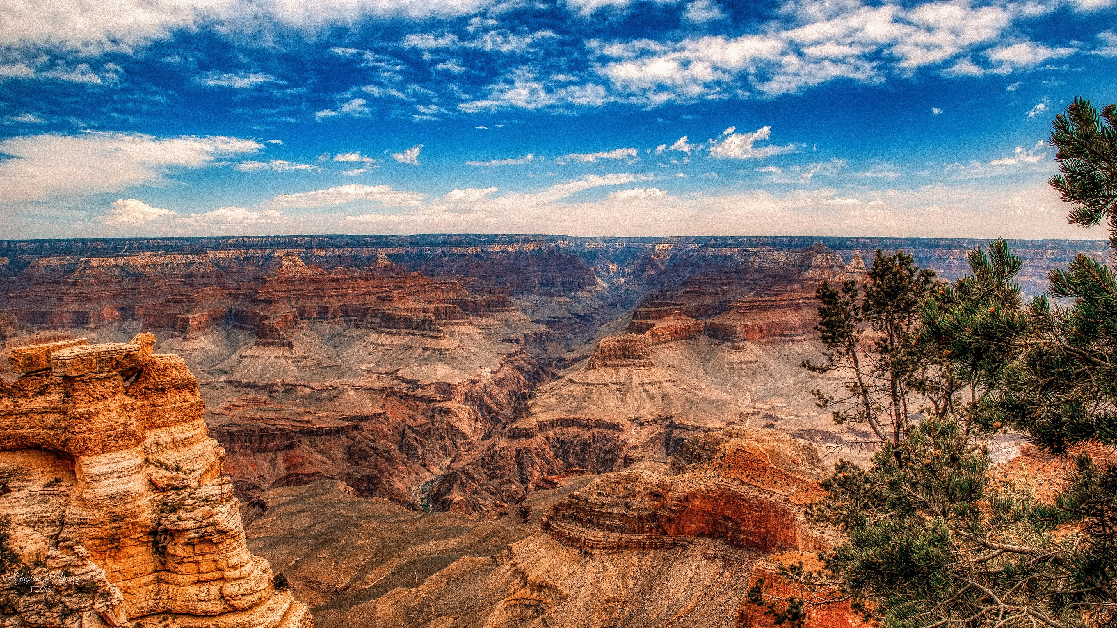 Layered red and tan cliffs of the Grand Canyon seen from Mather Point on the South Rim