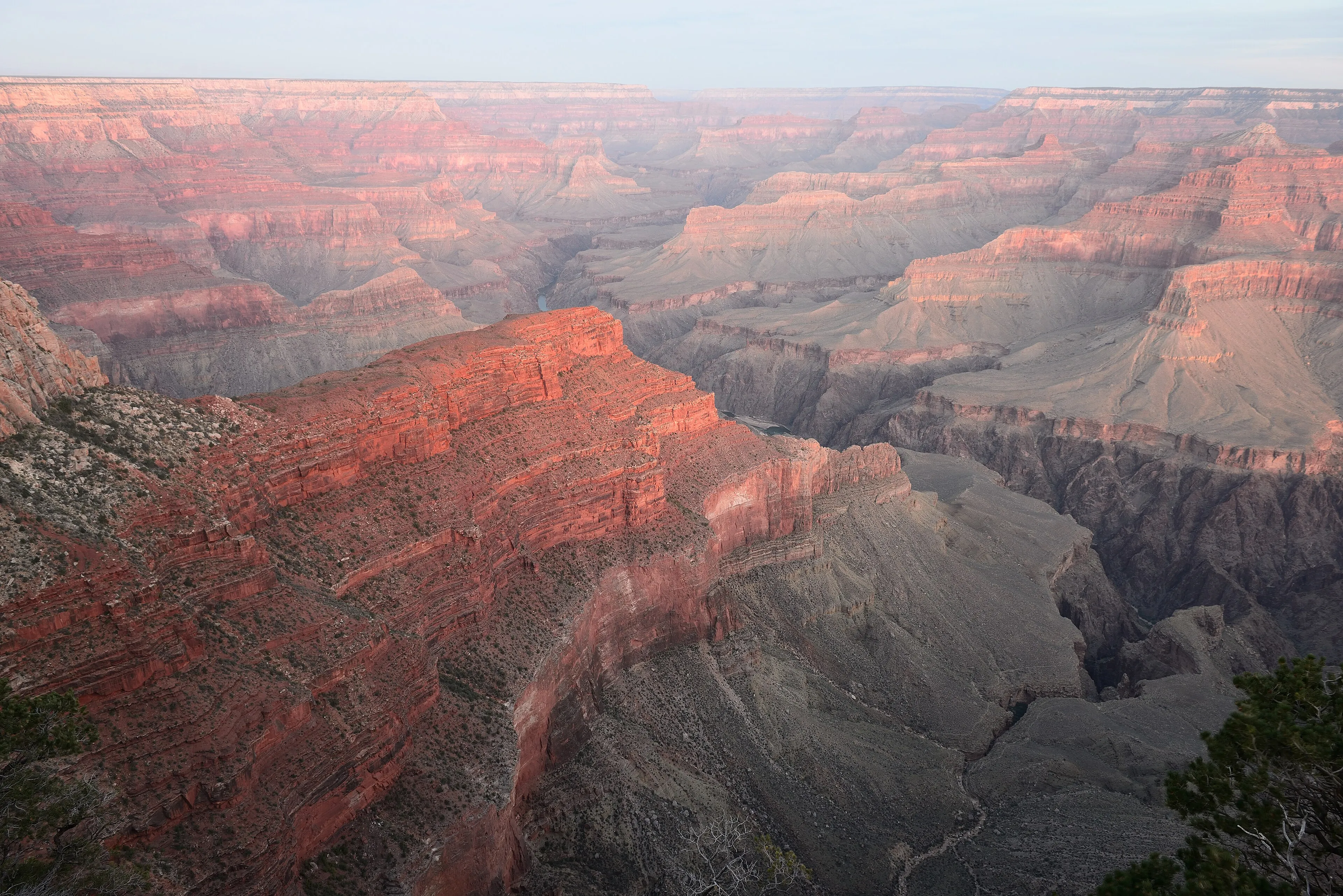 The Colorado River winding through the inner gorge of the Grand Canyon