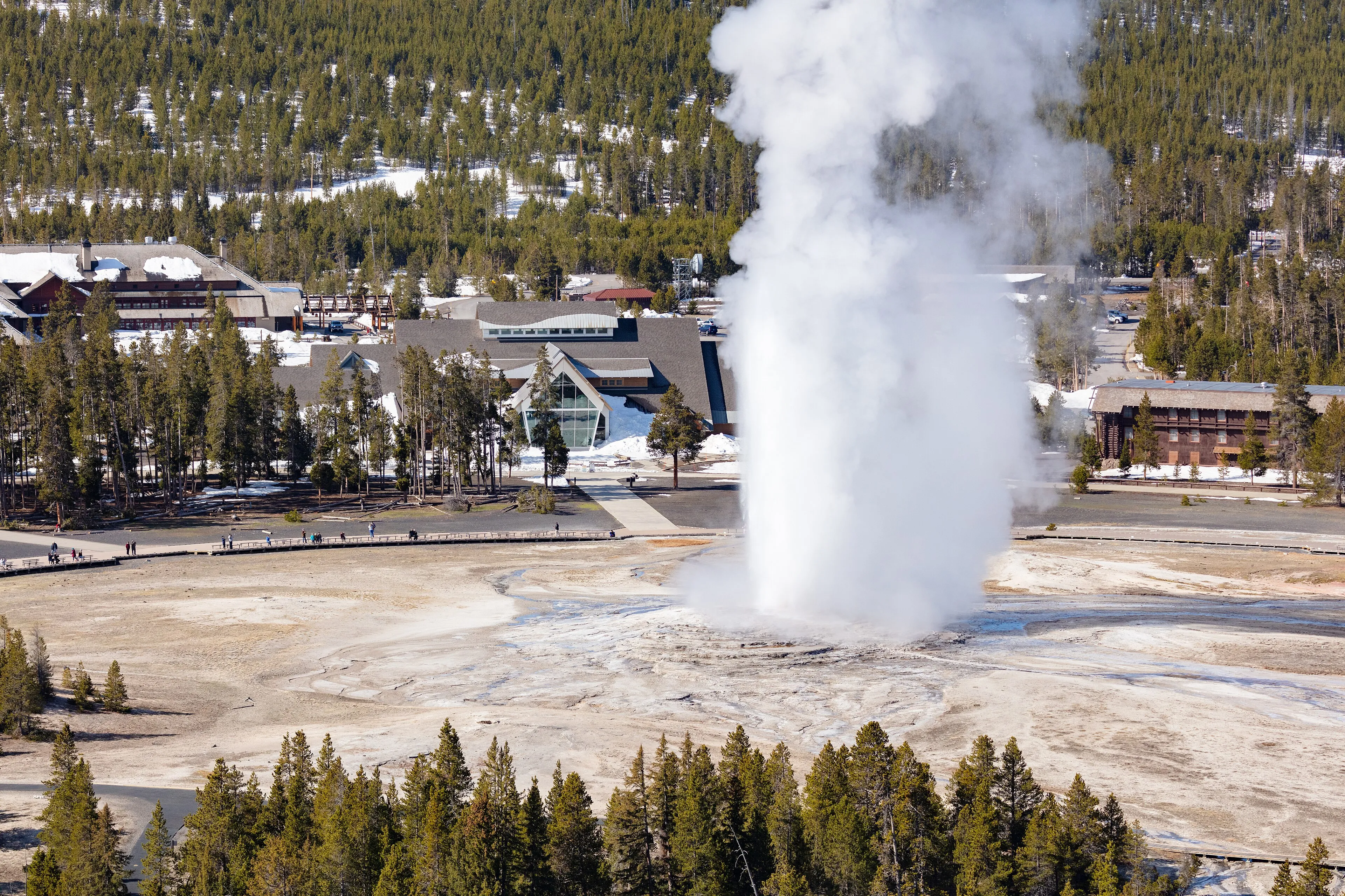 Old Faithful geyser erupting, seen from Observation Point